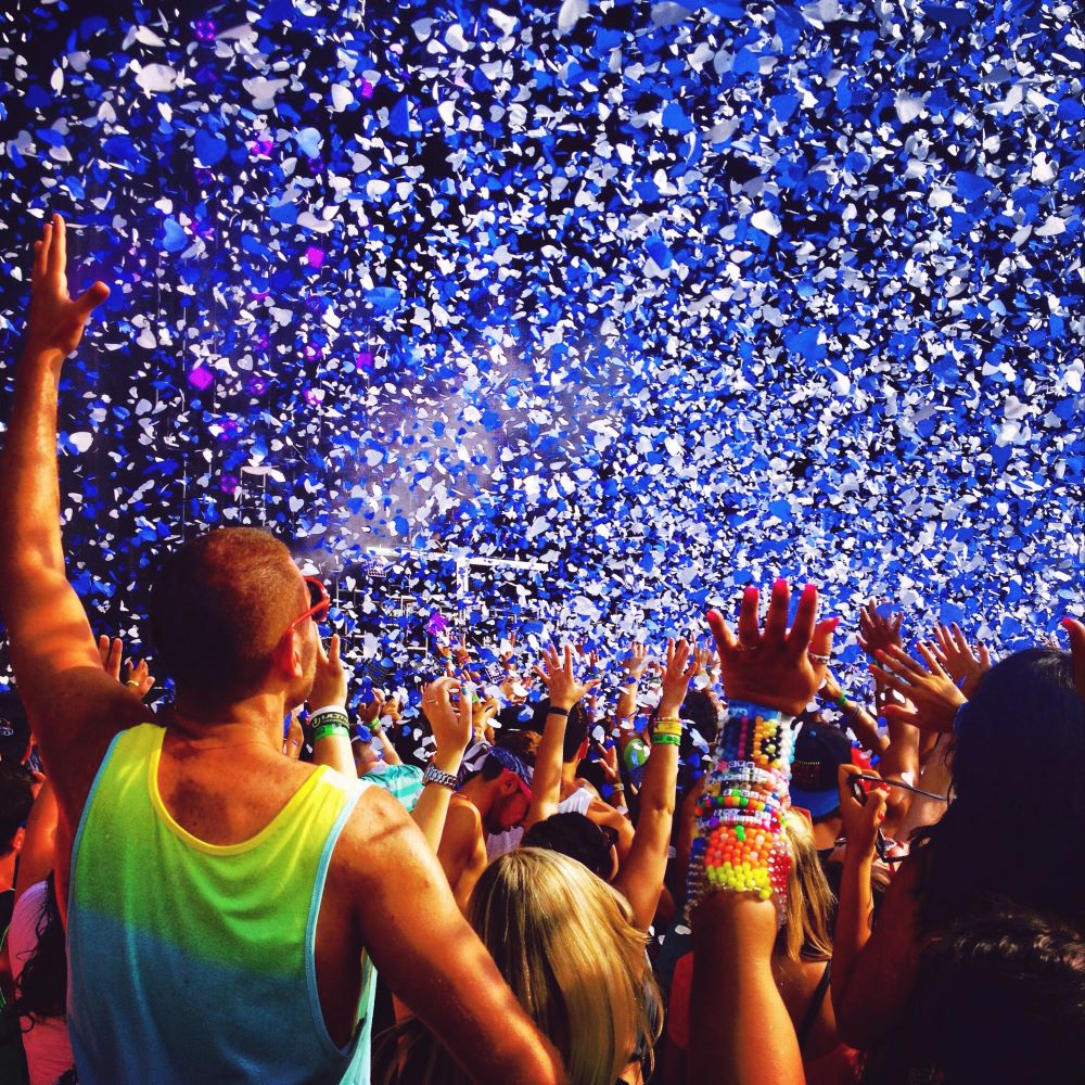 people celebrating at a festival because weather data for insurance protected the event's revenue